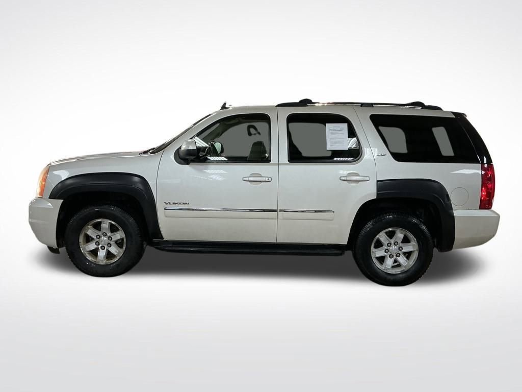 Used 2011 GMC Yukon SLT with VIN 1GKS2DE08BR117072 for sale in Traverse City, MI