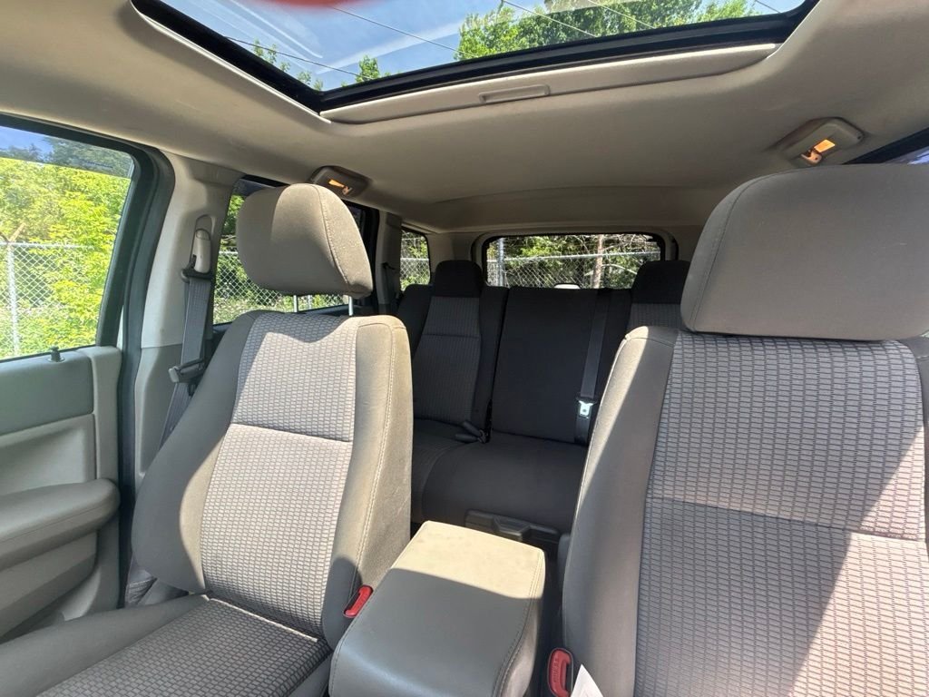 Used 2009 Stone White Jeep Laredo image 25