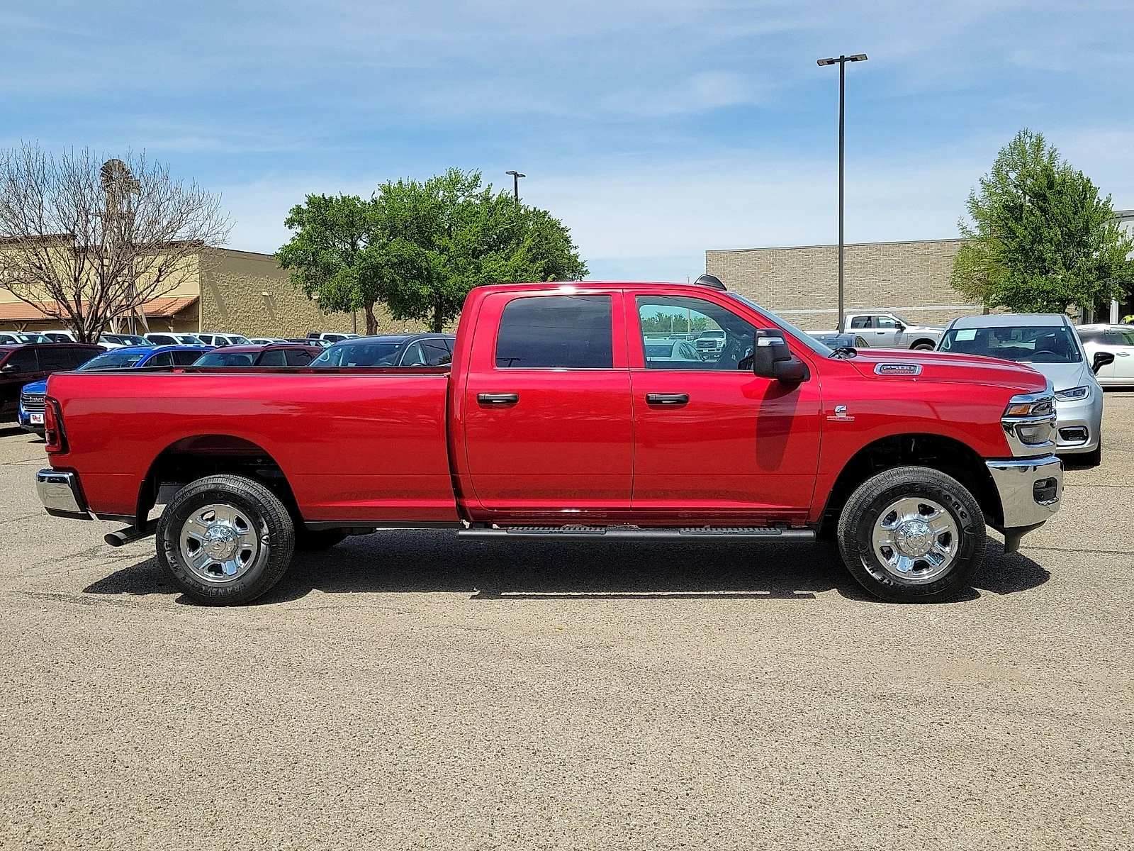 New 2026 PR6 Molten Red Ram TRADESMAN CREW CAB 4X4 8