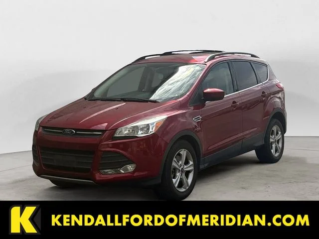 Used 2014 Ruby Red Ford SE image 1