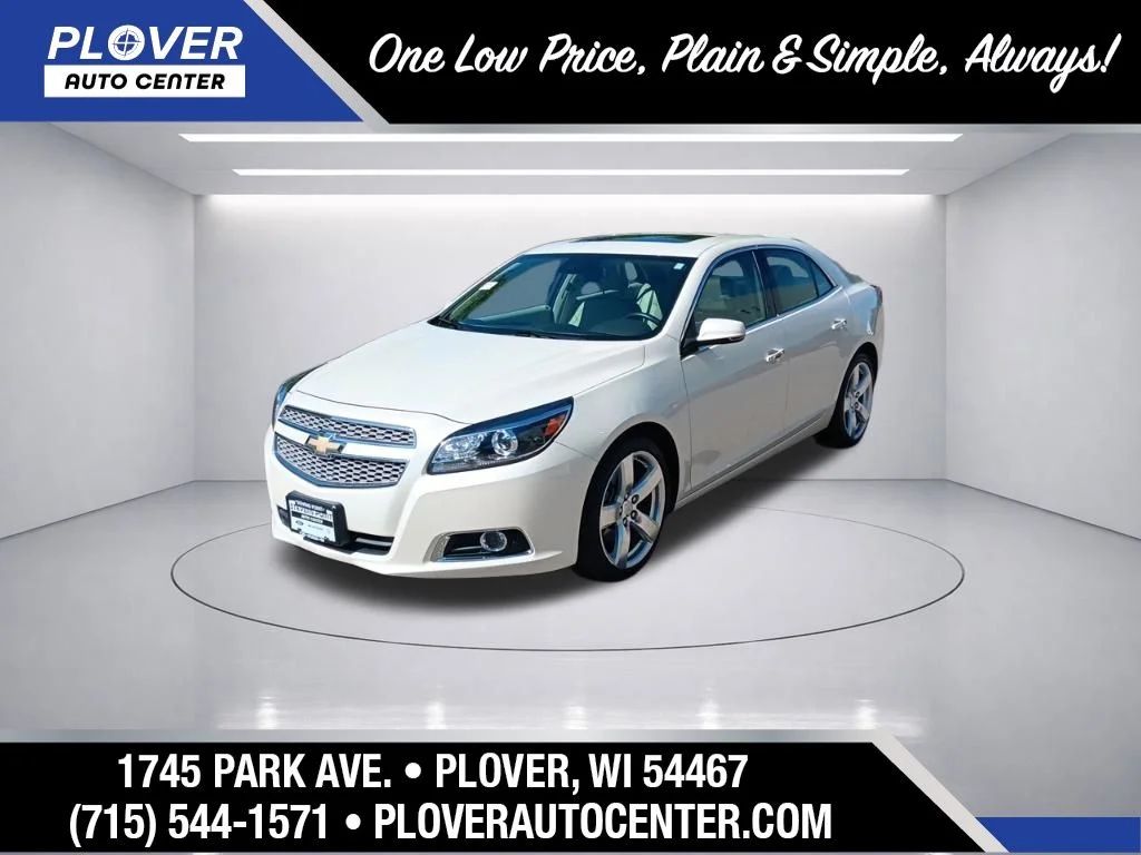 Used 2013 White Diamond Tricoat Chevrolet LTZ image 1