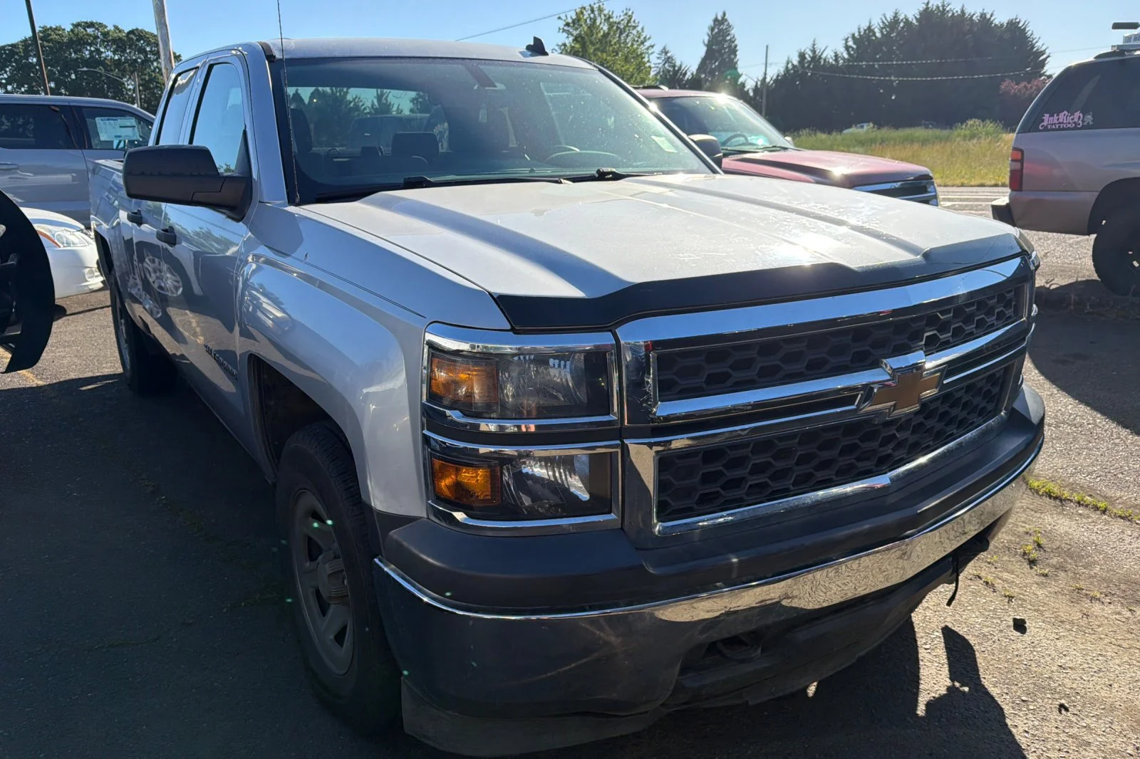 Used 2014 Silver Ice Metallic Chevrolet Work Truck image 2