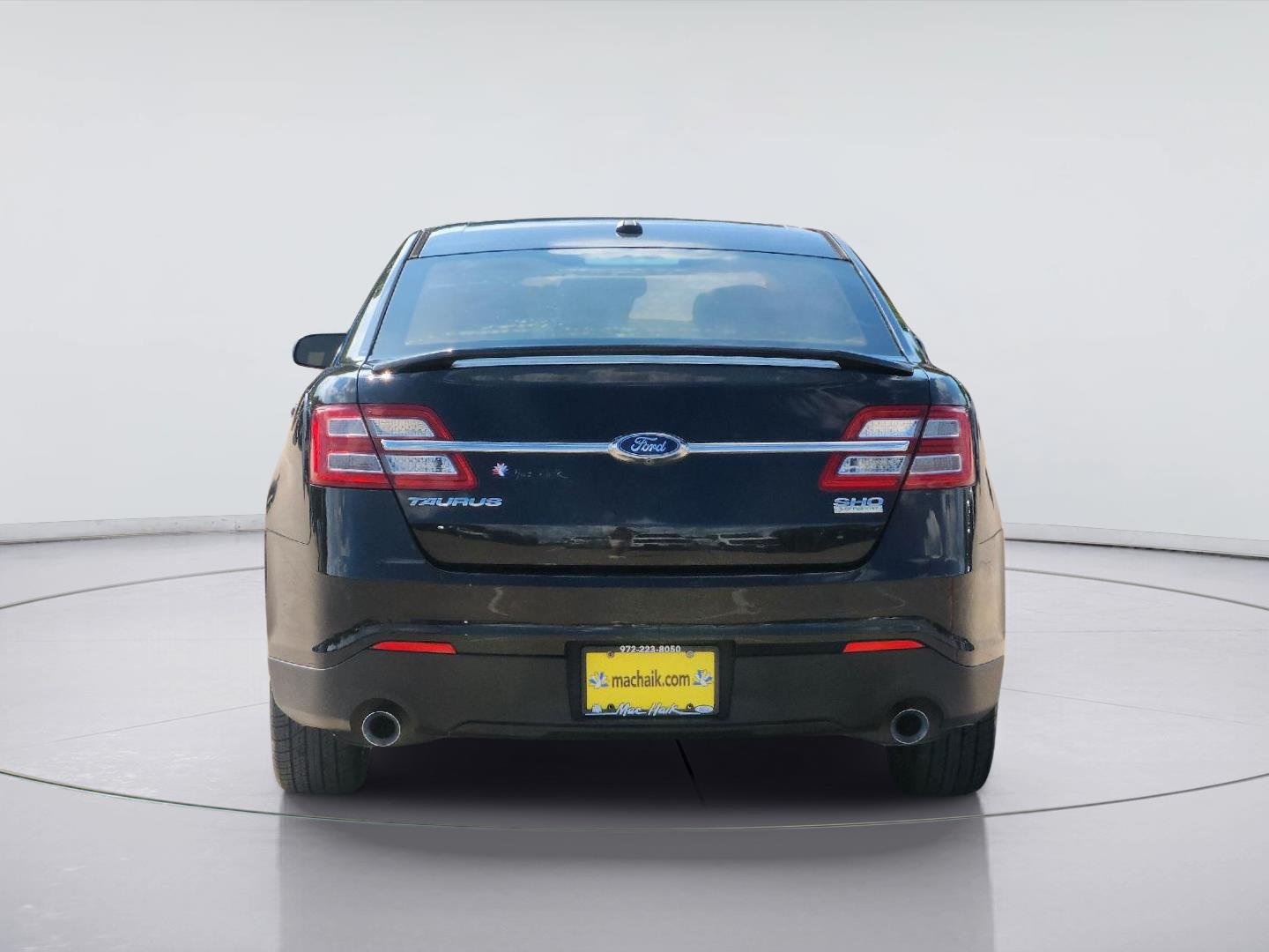 Used 2013 Tuxedo Black Metallic Ford SHO image 5