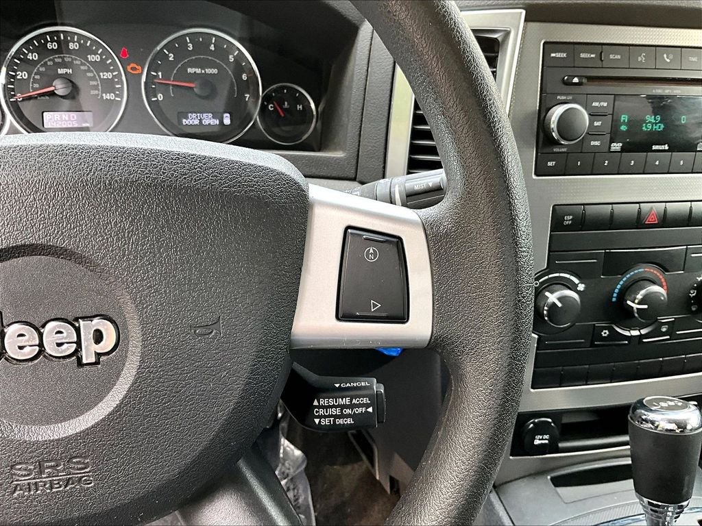 Used 2009 Modern Blue Pearlcoat Jeep Laredo image 23