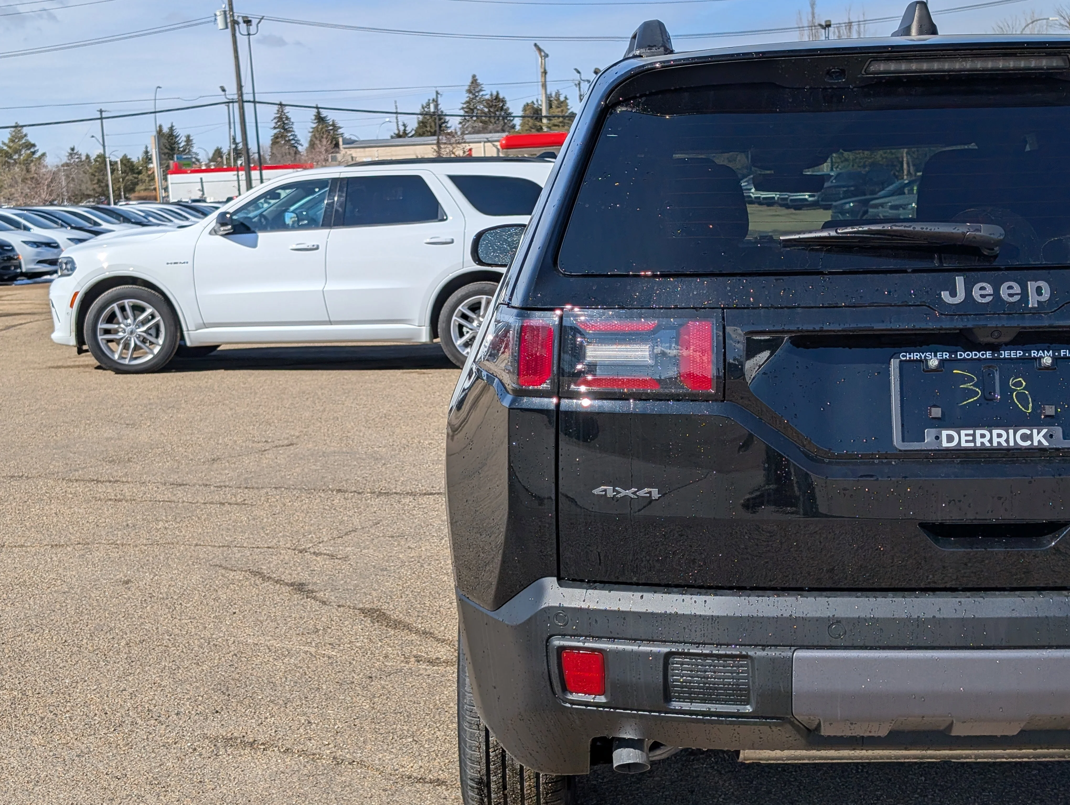 New 2026 Diamond Black Crystal Pearl Jeep Laredo image 13