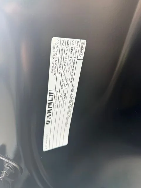 Used 2024 Agate Black Metallic Ford Lariat image 3
