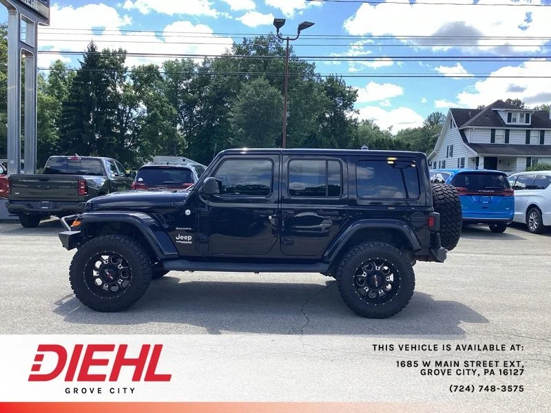 Used 2018 Black Jeep Unlimited Sahara image 4
