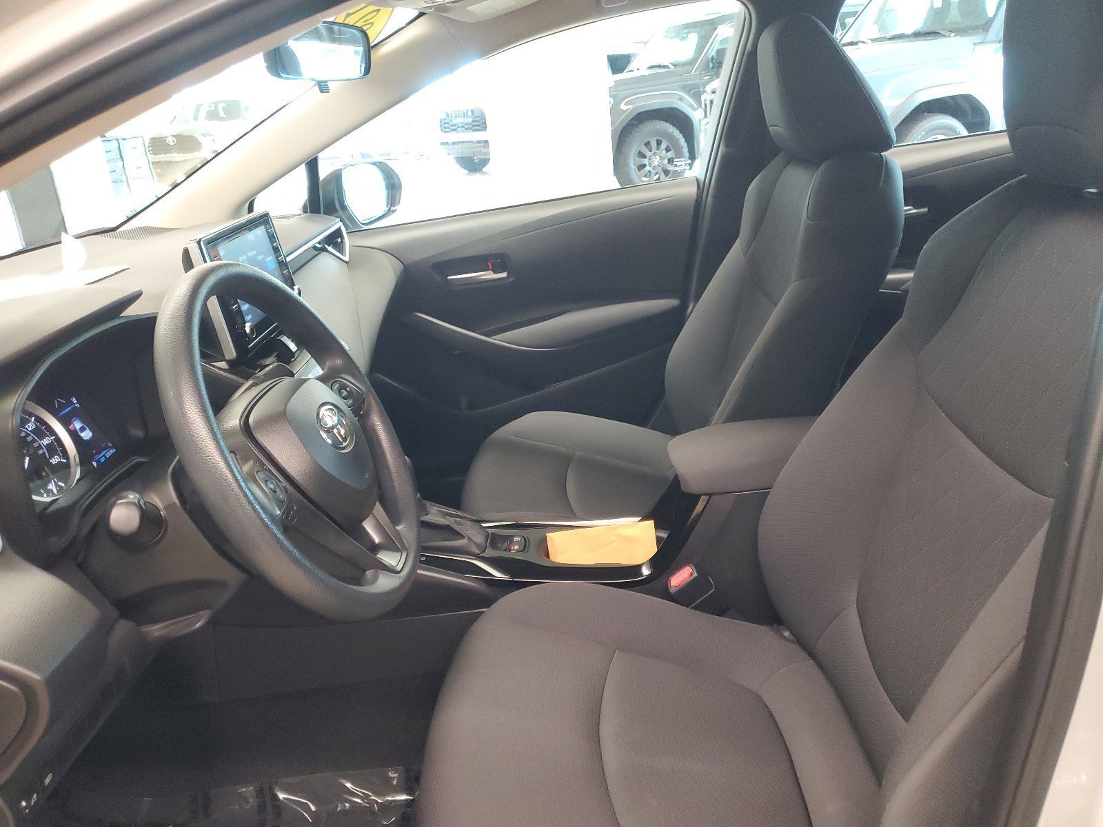 Used 2021 Classic Silver Metallic Toyota LE image 17