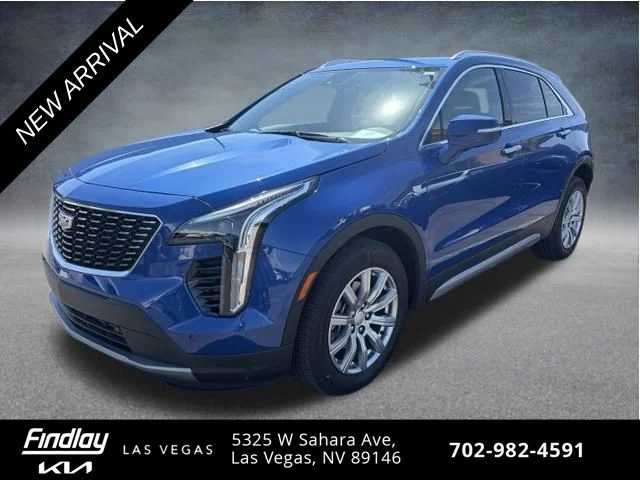 Used 2023 Blue Cadillac Premium Luxury image 1