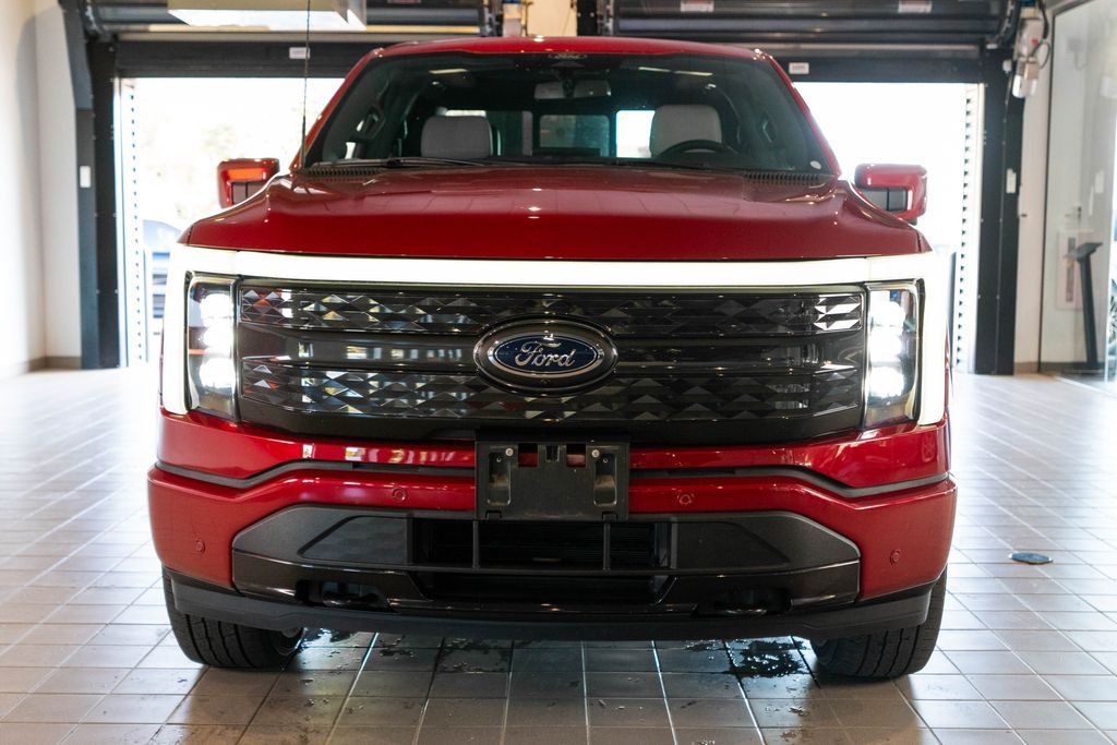 Used 2022 Ford F-150 Lightning Platinum with VIN 1FT6W1EV7NWG01641 for sale in Glendale, WI