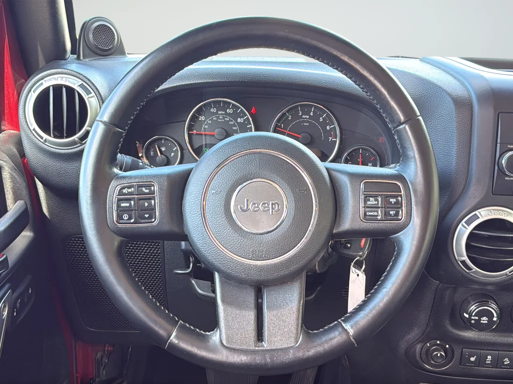 Used 2012 Red Jeep Unlimited Sahara image 27
