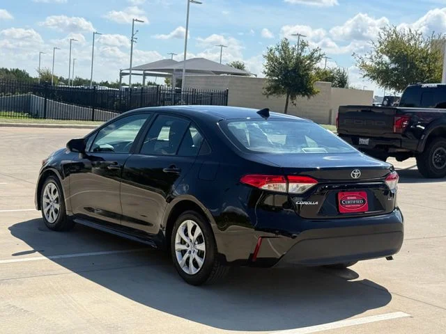 Used 2025 Midnight Black Metallic Toyota LE image 9