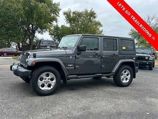 Used 2014 Gray Jeep Unlimited Sahara image 4