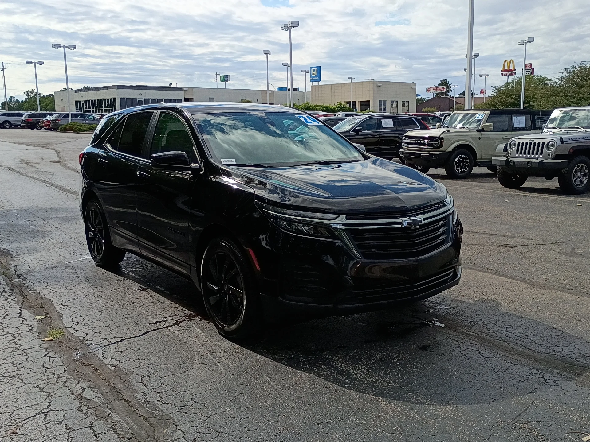 Used 2024 Mosaic Black Metallic Chevrolet LS image 1