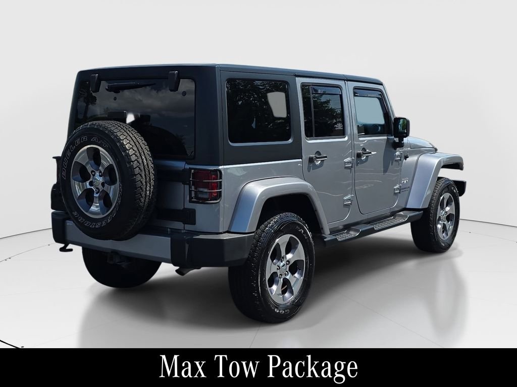Used 2016 Silver Jeep Unlimited Sahara image 5