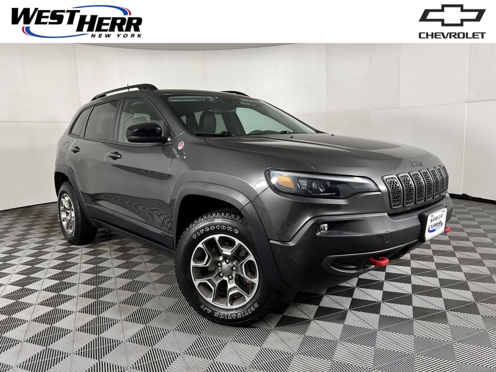 Used 2022 Granite Crystal Metallic Clearcoat Jeep Trailhawk image 1