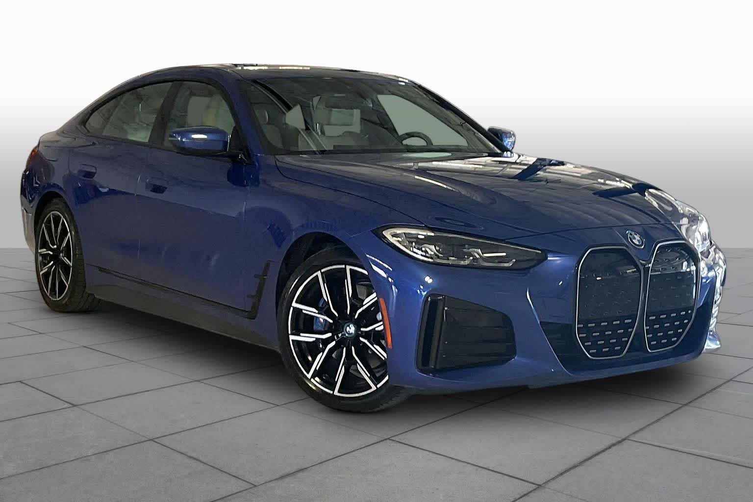 Used 2023 Portimao Blue Metallic BMW eDrive40 image 2