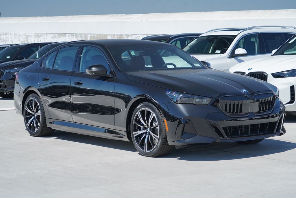 New 2027 Black Sapphire Metallic BMW 550e xDrive image 3