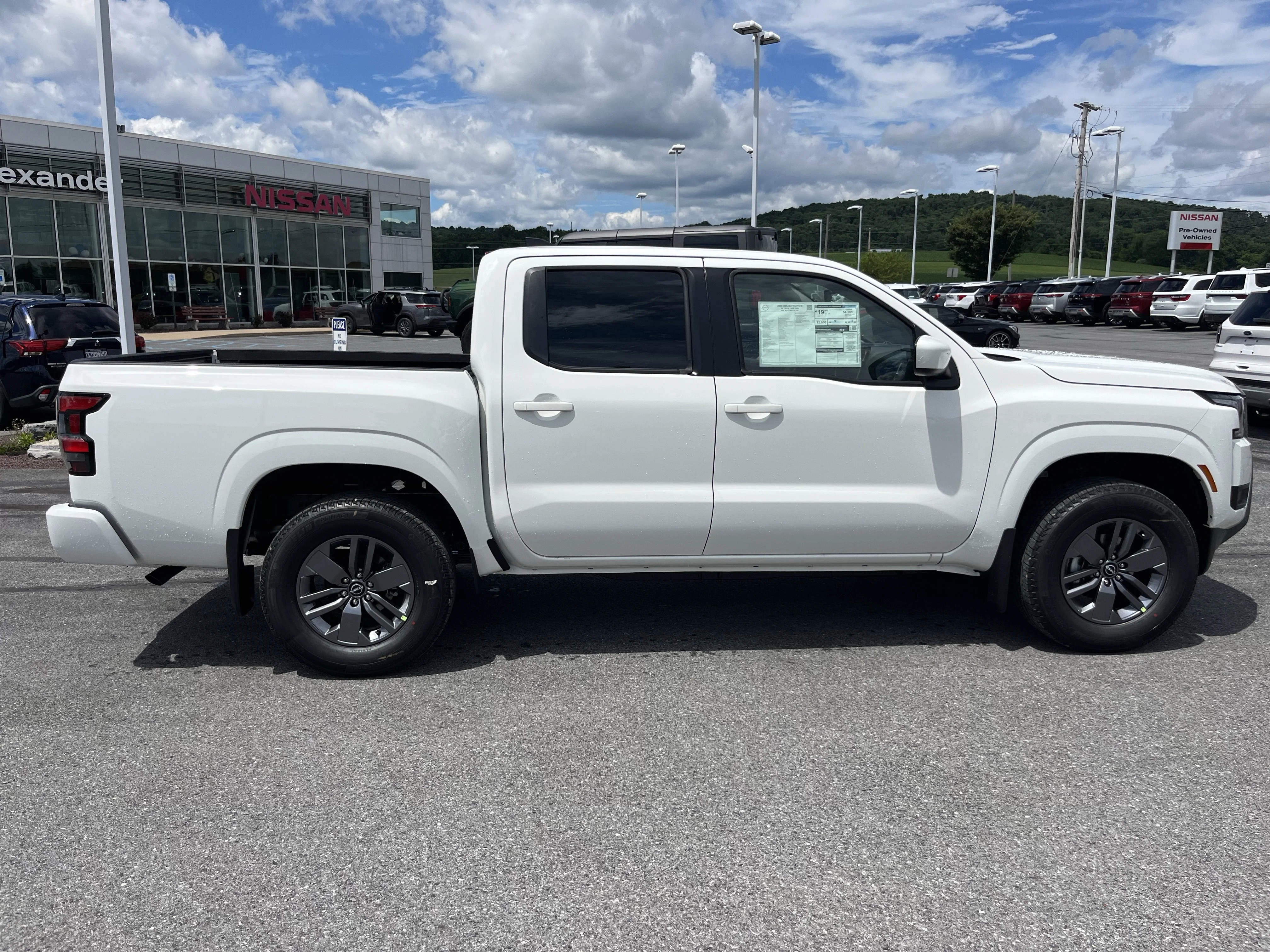 New 2026 Glacier White Nissan Crew Cab SV image 2