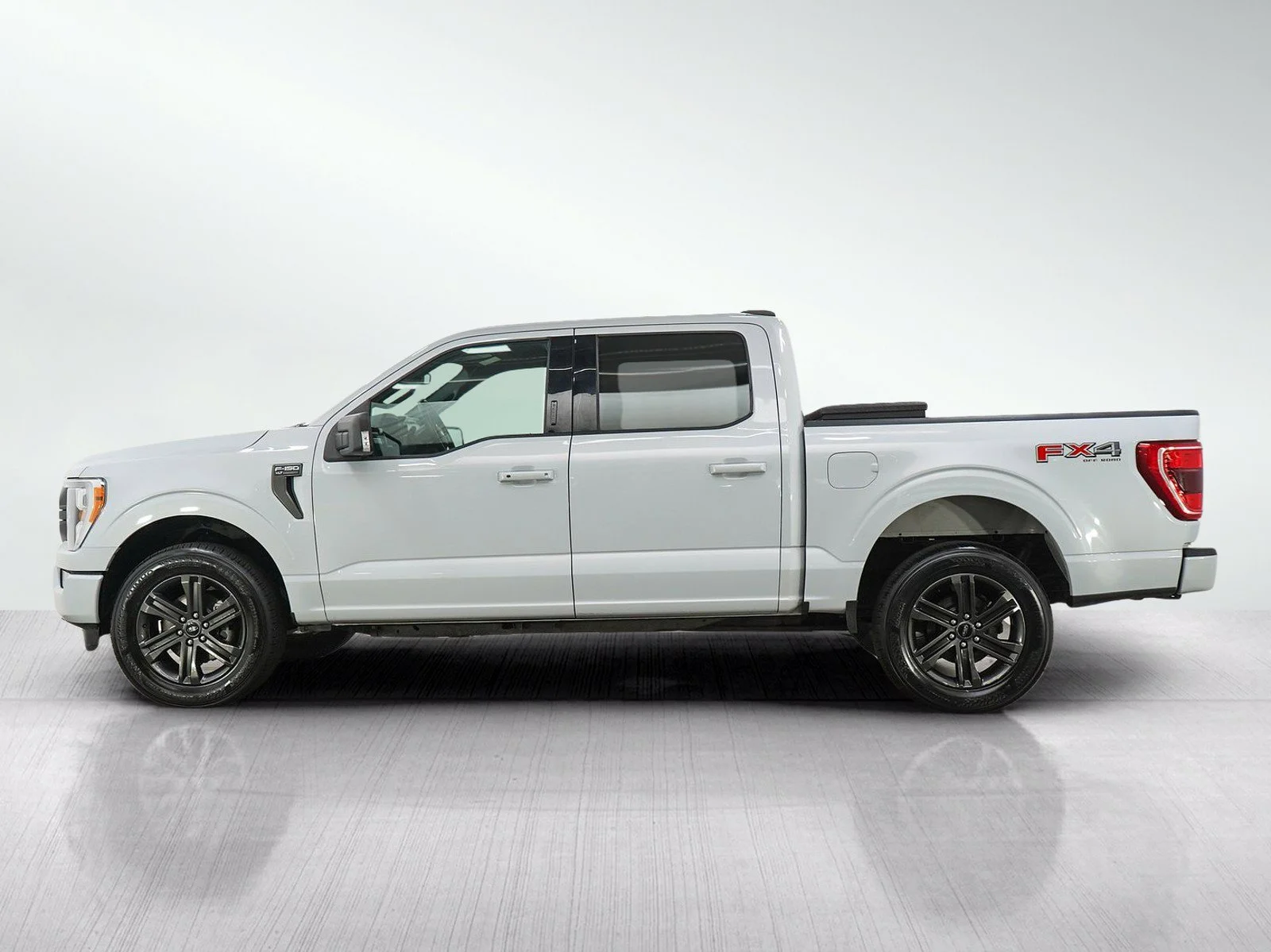 Used 2021 Ford F-150 XLT with VIN 1FTFW1E81MKD76973 for sale in Minneapolis, Minnesota