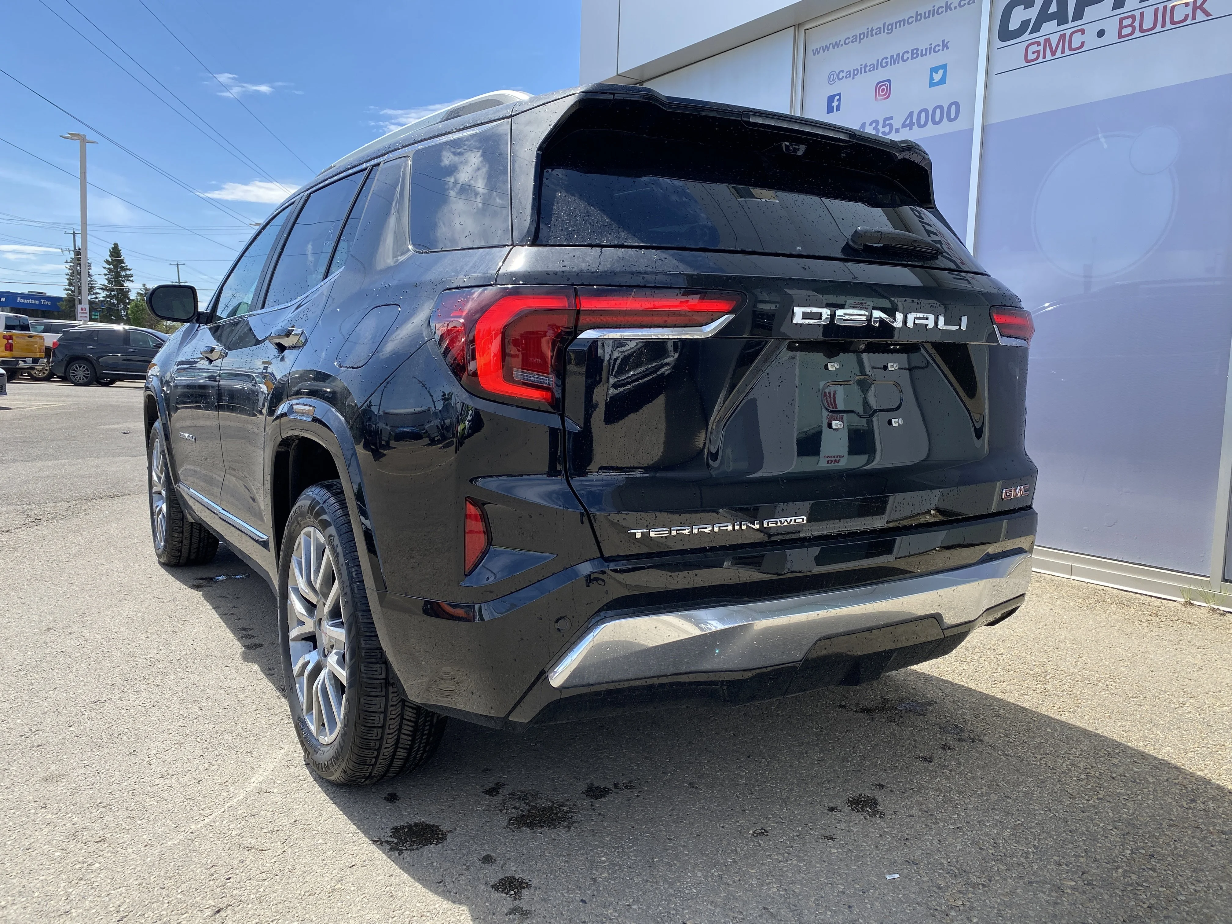 New 2026 EBONY TWILIGHT METALLIC GMC AWD Denali image 4