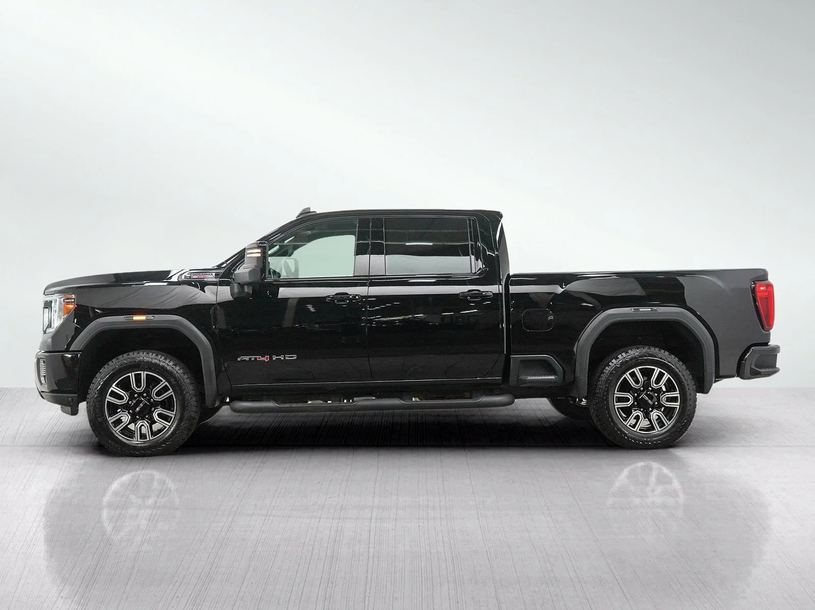 Used 2023 GMC Sierra 2500HD AT4 with VIN 1GT49PEY0PF114022 for sale in Wayzata, Minnesota