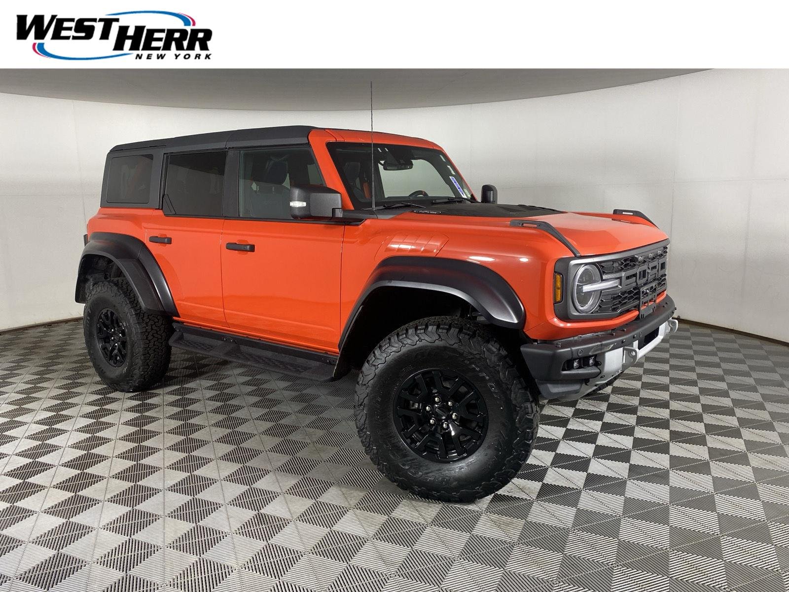 Used 2022 Code Orange Ford Raptor image 1