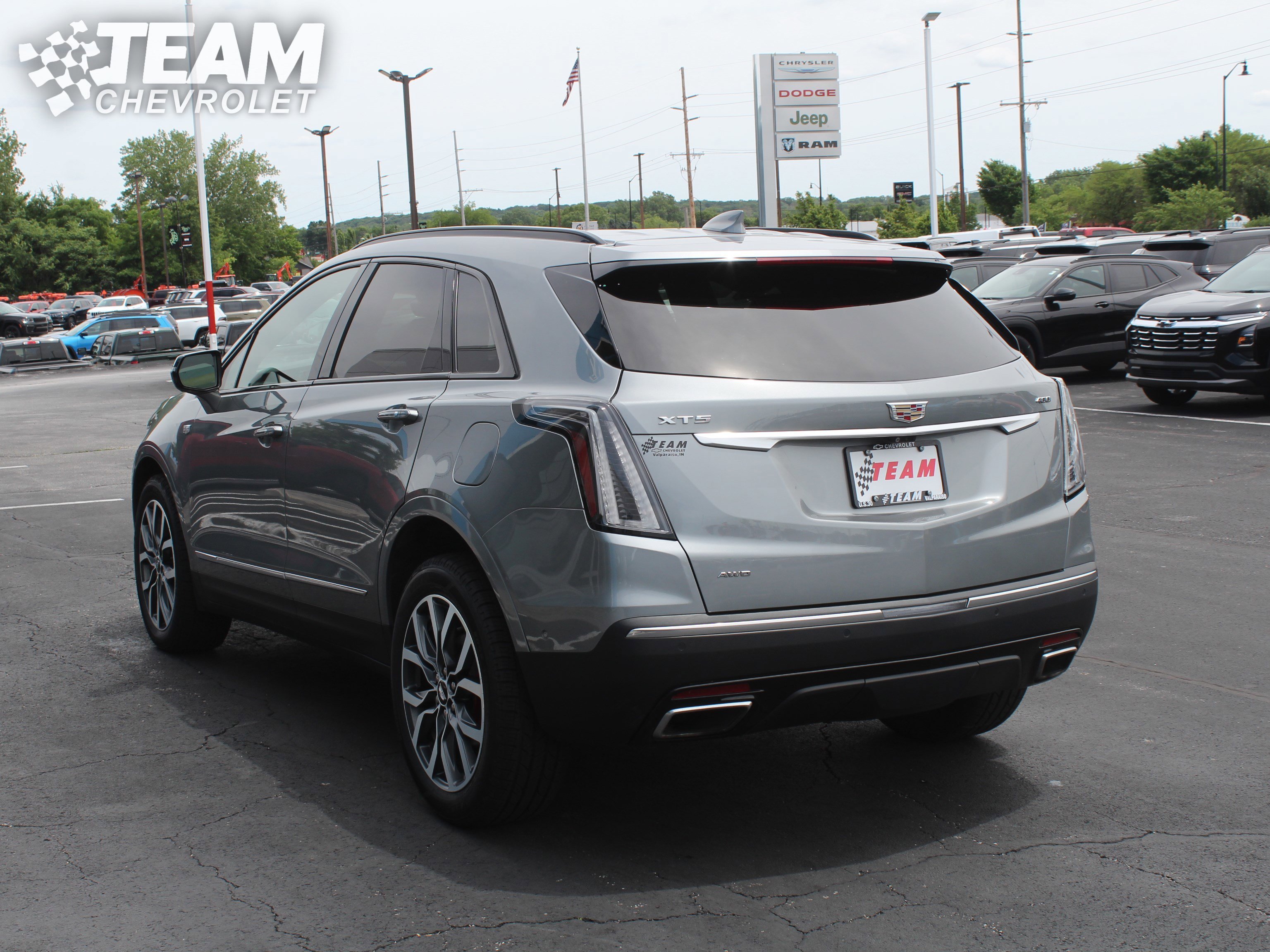 Used 2024 Argent Silver Metallic Cadillac Sport image 6