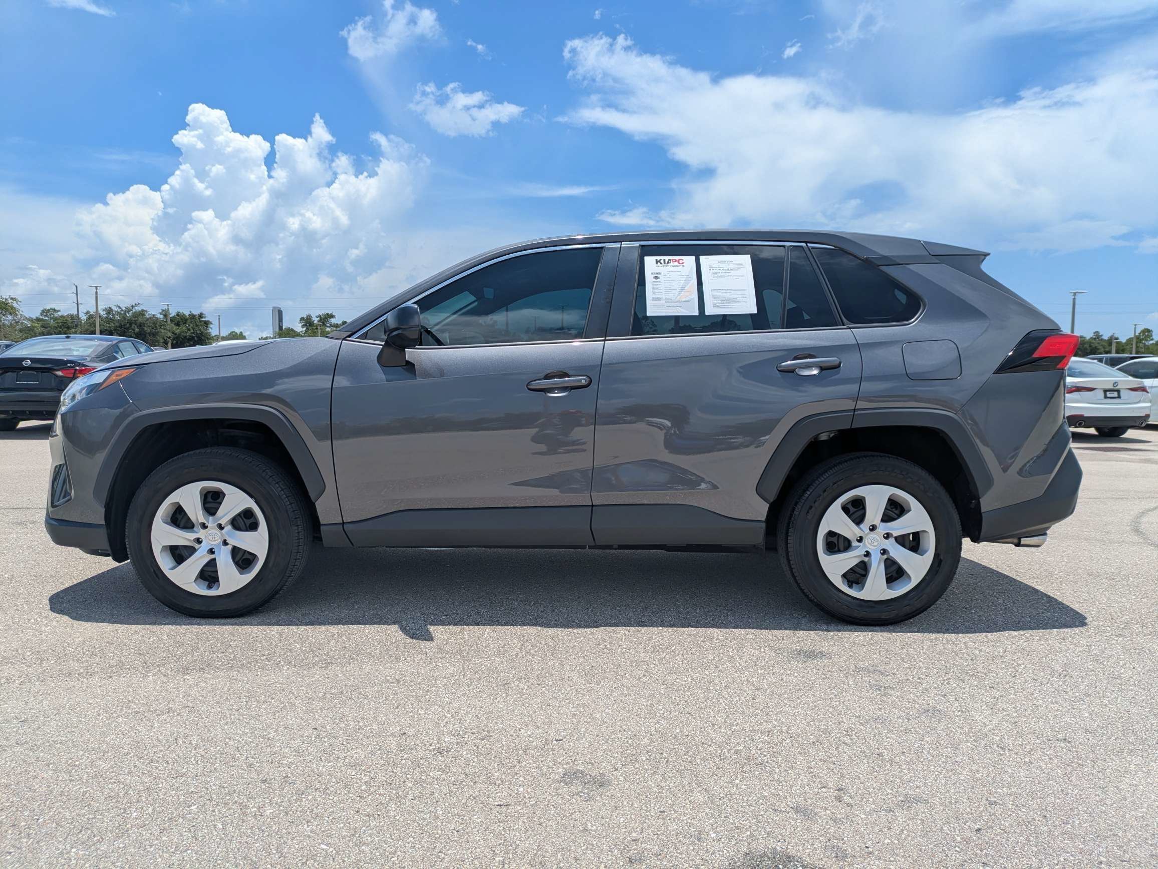 Used 2024 Magnetic Gray Metallic Toyota LE image 7