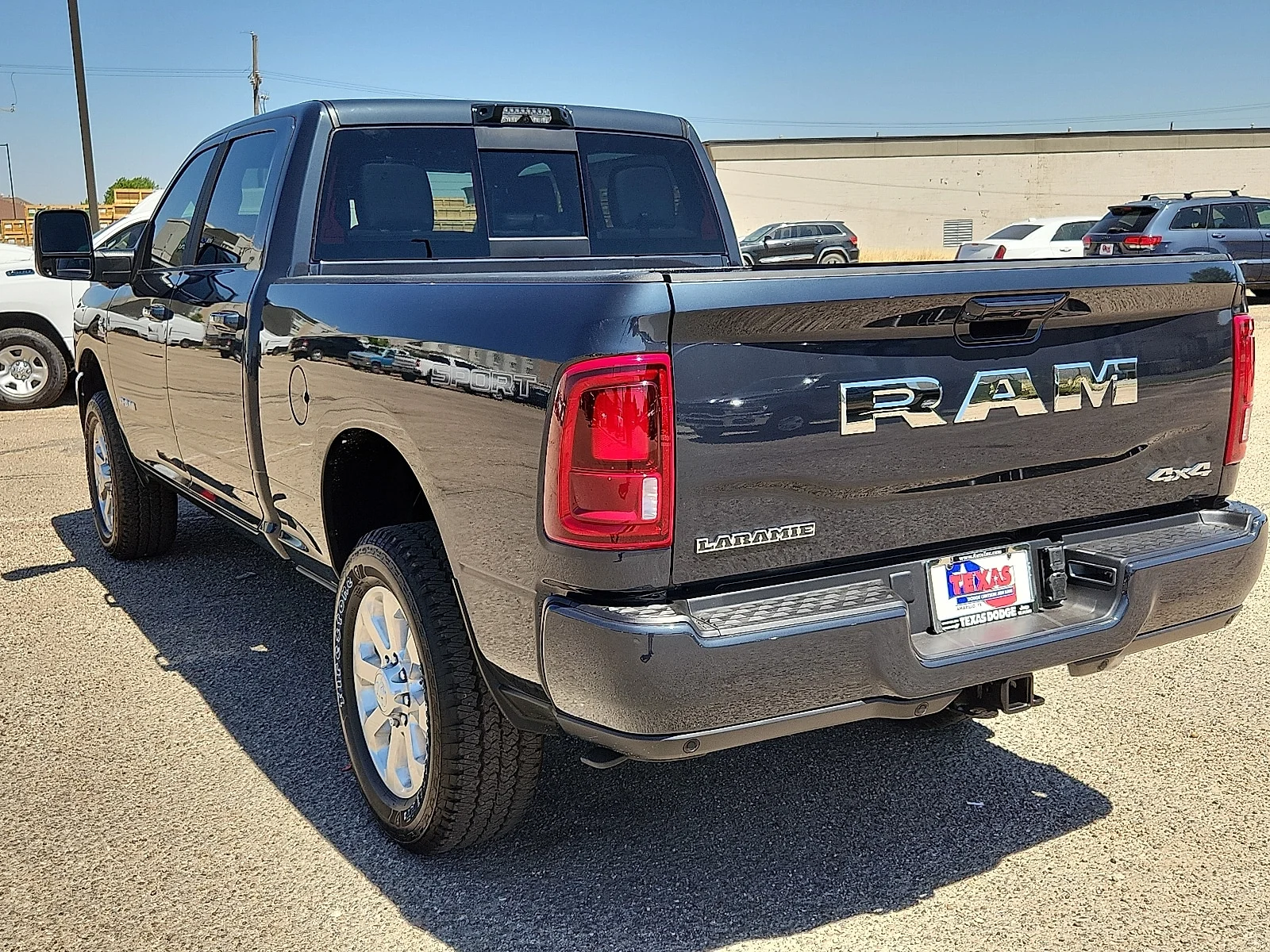 New 2026 Forged Blue Ram LARAMIE CREW CAB 4X4 6
