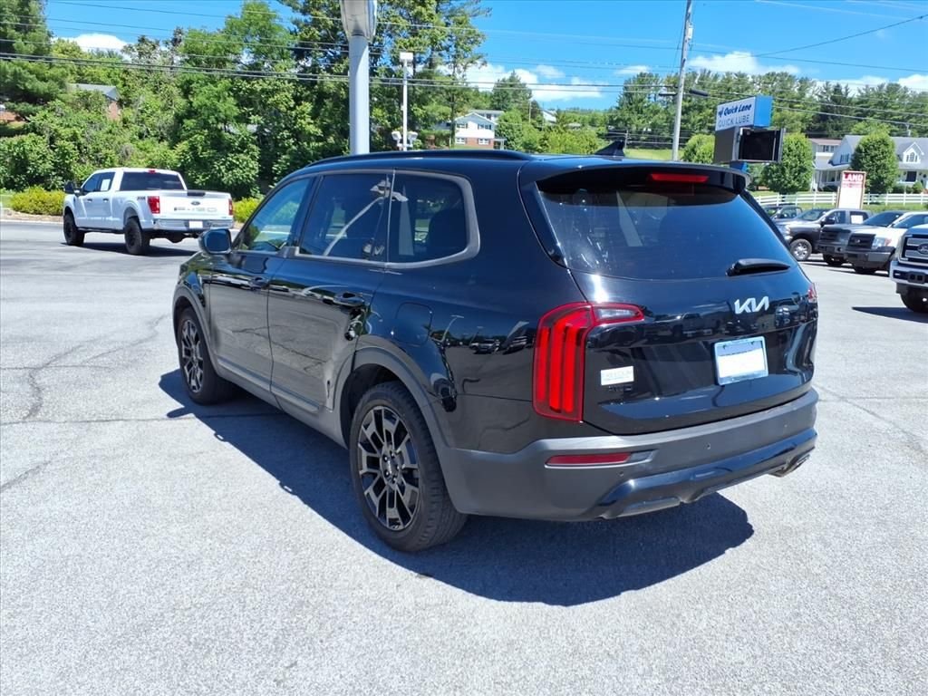 Used 2022 Ebony Black Kia EX image 3