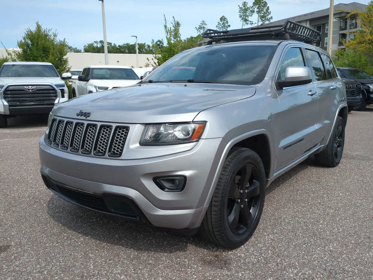 Used 2015 Jeep Grand Cherokee Altitude with VIN 1C4RJFAGXFC211247 for sale in Wesley Chapel, FL