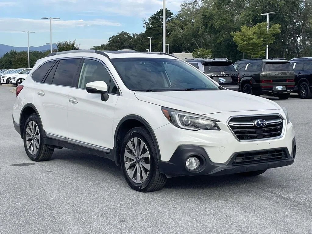 Used 2019 Crystal White Pearl Subaru Touring image 1