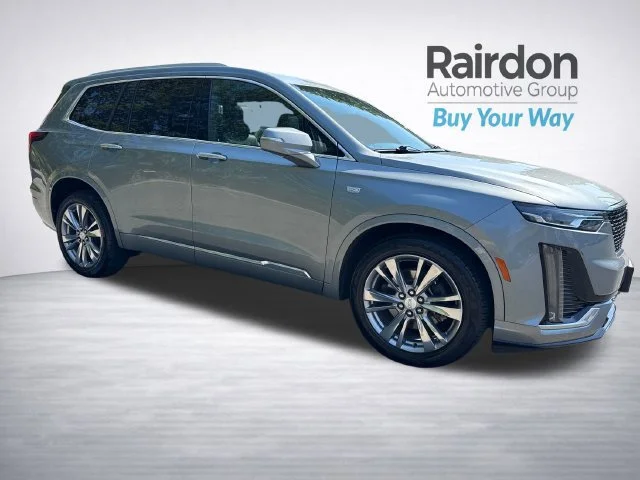 Used 2023 Argent Silver Metallic Cadillac Premium Luxury image 1