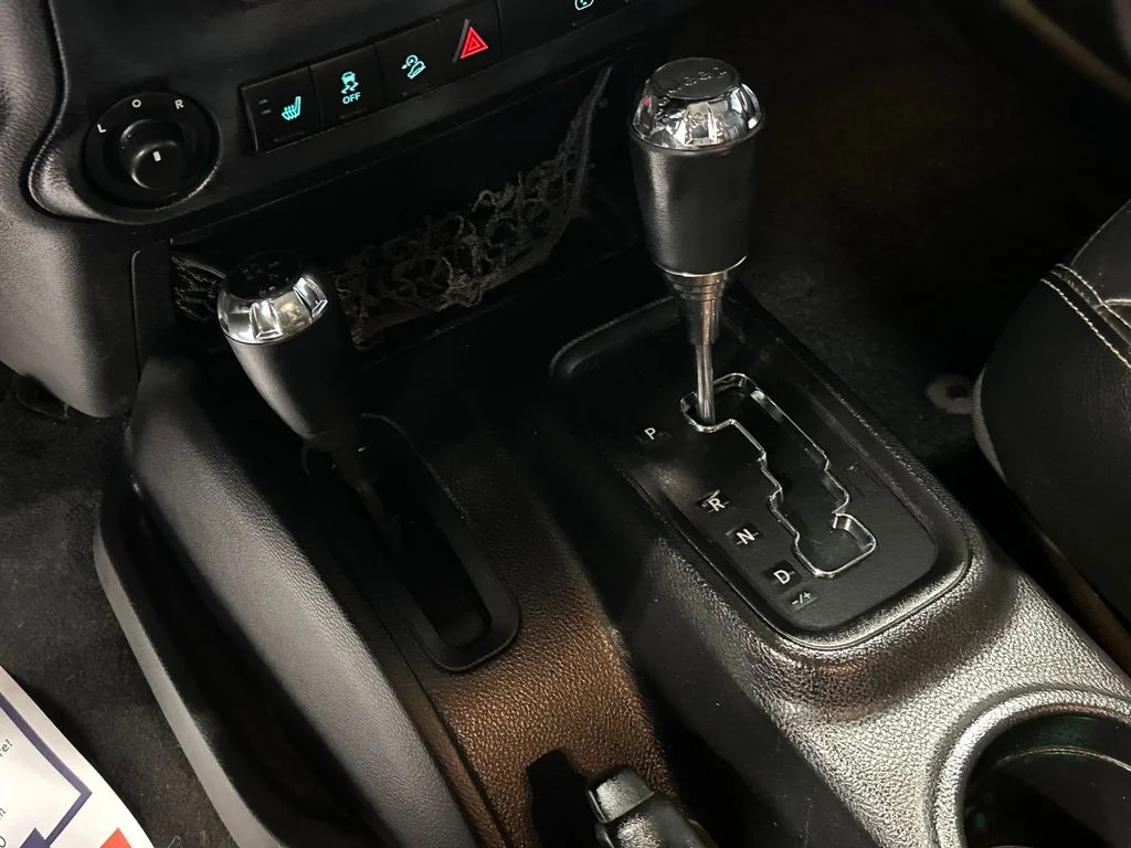 Used 2016 Black Jeep Unlimited Sahara image 21