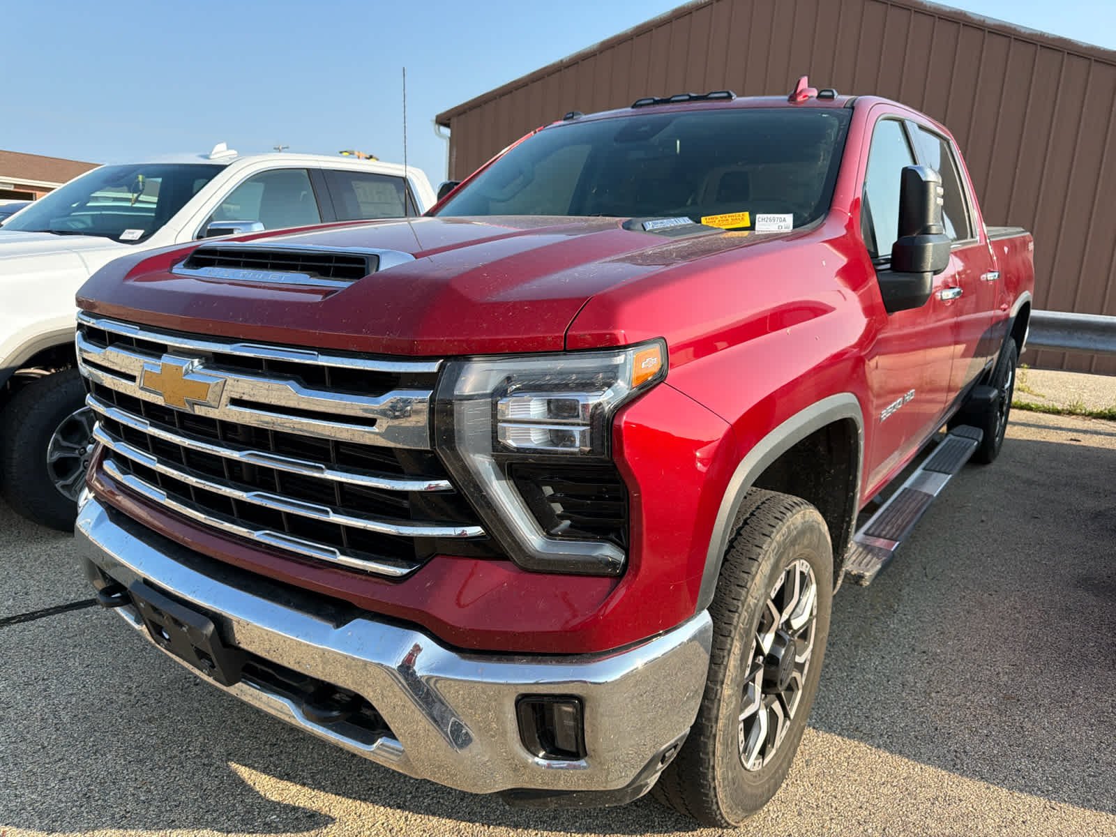 Used 2024 Radiant Red Tintcoat Chevrolet LTZ image 1