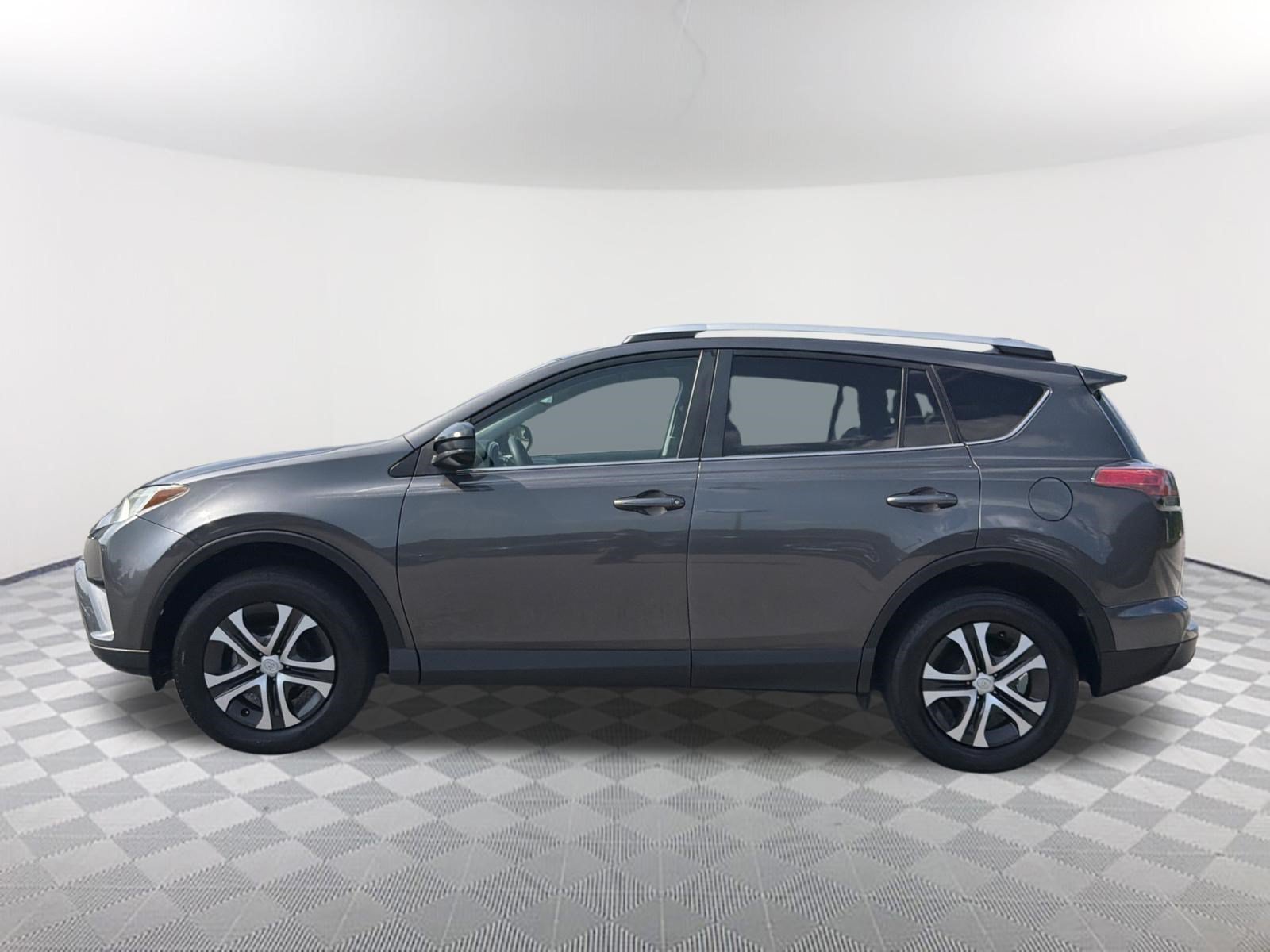 Used 2016 Magnetic Gray Metallic Toyota LE image 12
