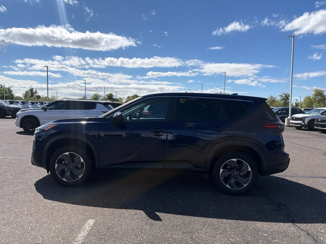 Used 2024 Deep Ocean Blue Pearl Nissan SV image 7