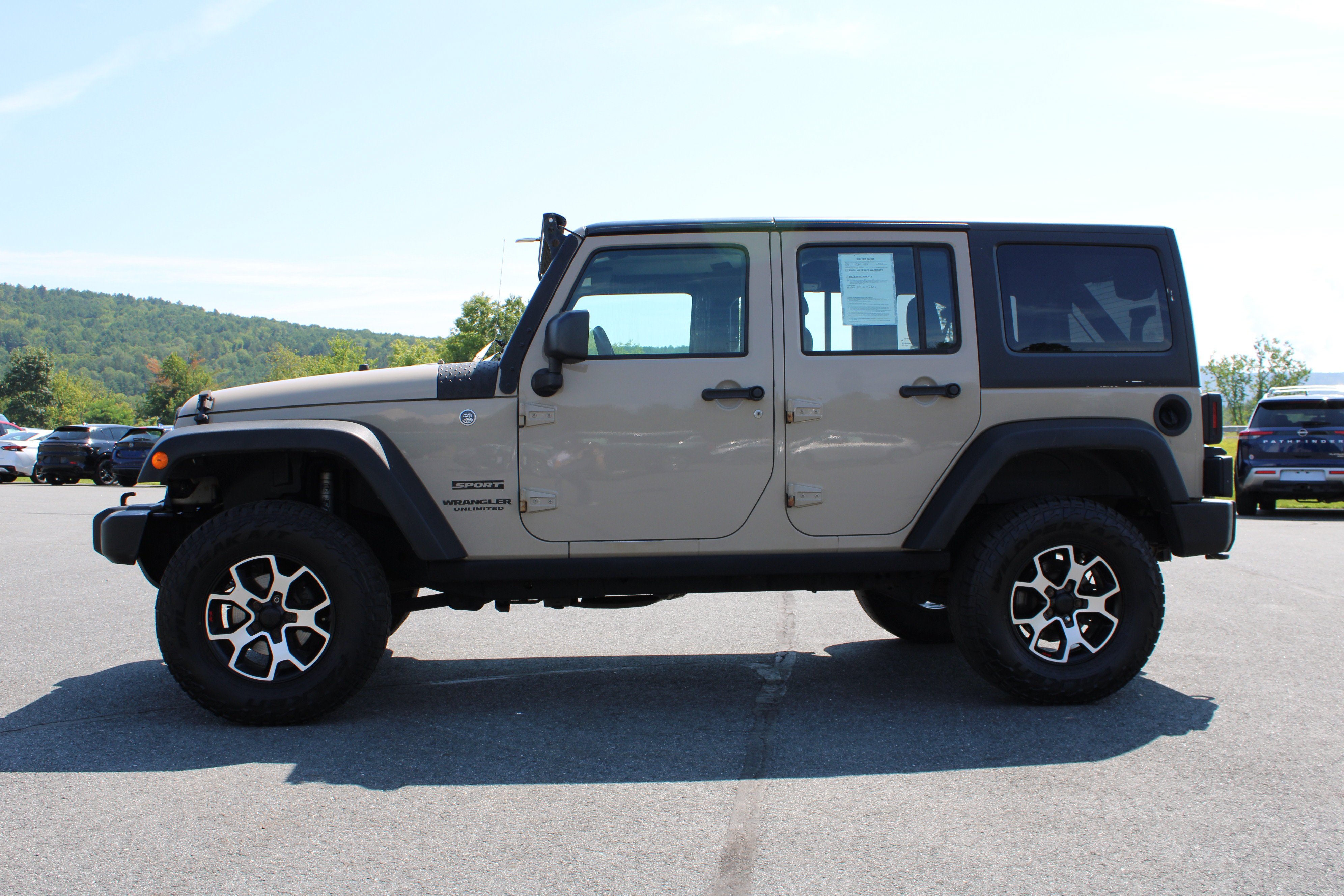 Used 2016 Mojave Sand Clearcoat Jeep Sport image 13