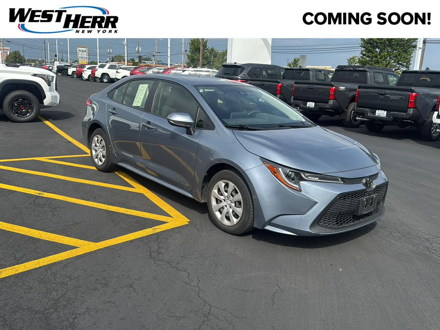 Used 2020 Celestite Gray Metallic Toyota LE image 1
