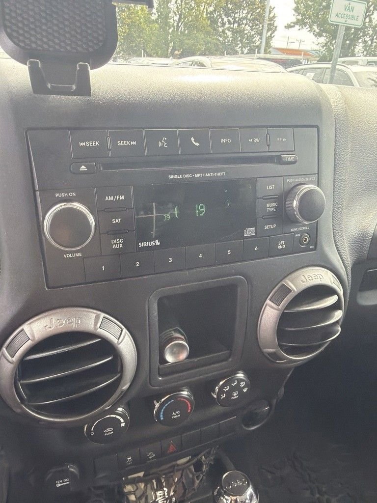 Used 2016 Black Clearcoat Jeep Sport image 7
