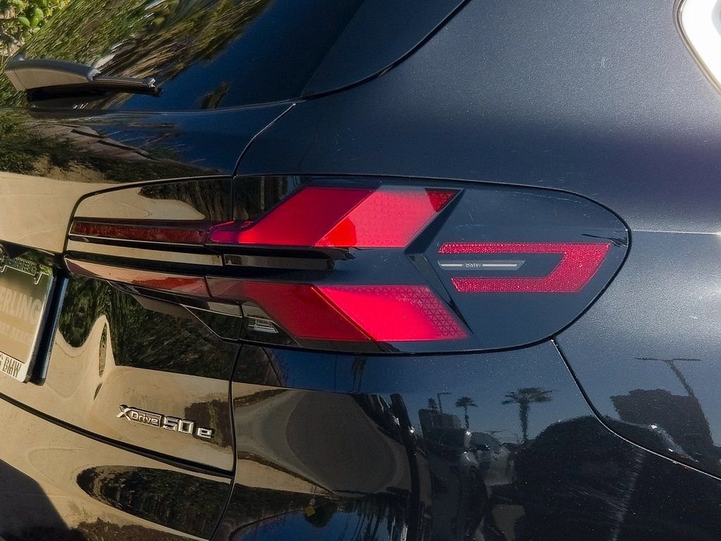 New 2026 Black Sapphire Metallic BMW xDrive50e image 7