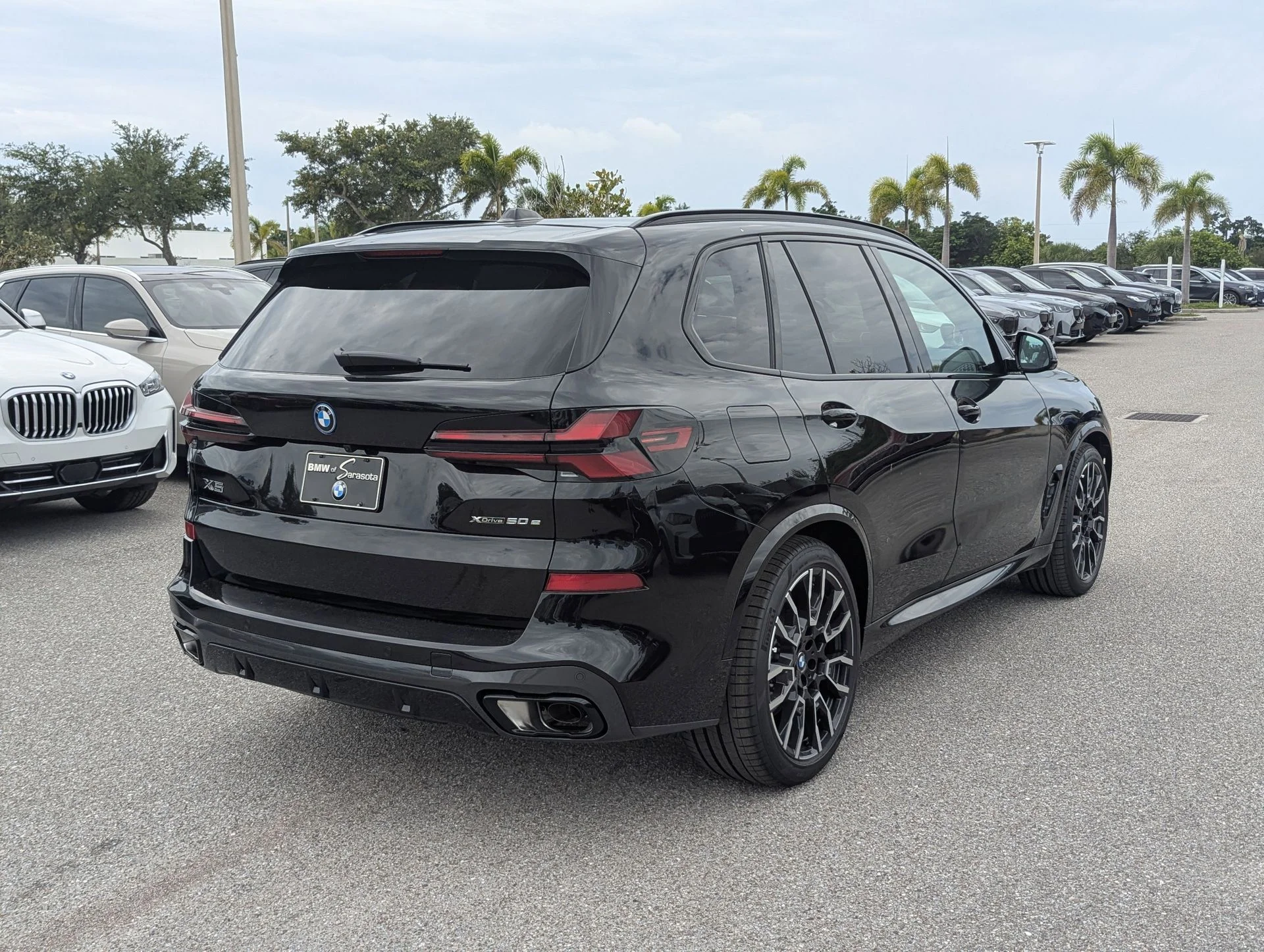 New 2026 Black Sapphire Metallic BMW xDrive50e image 7
