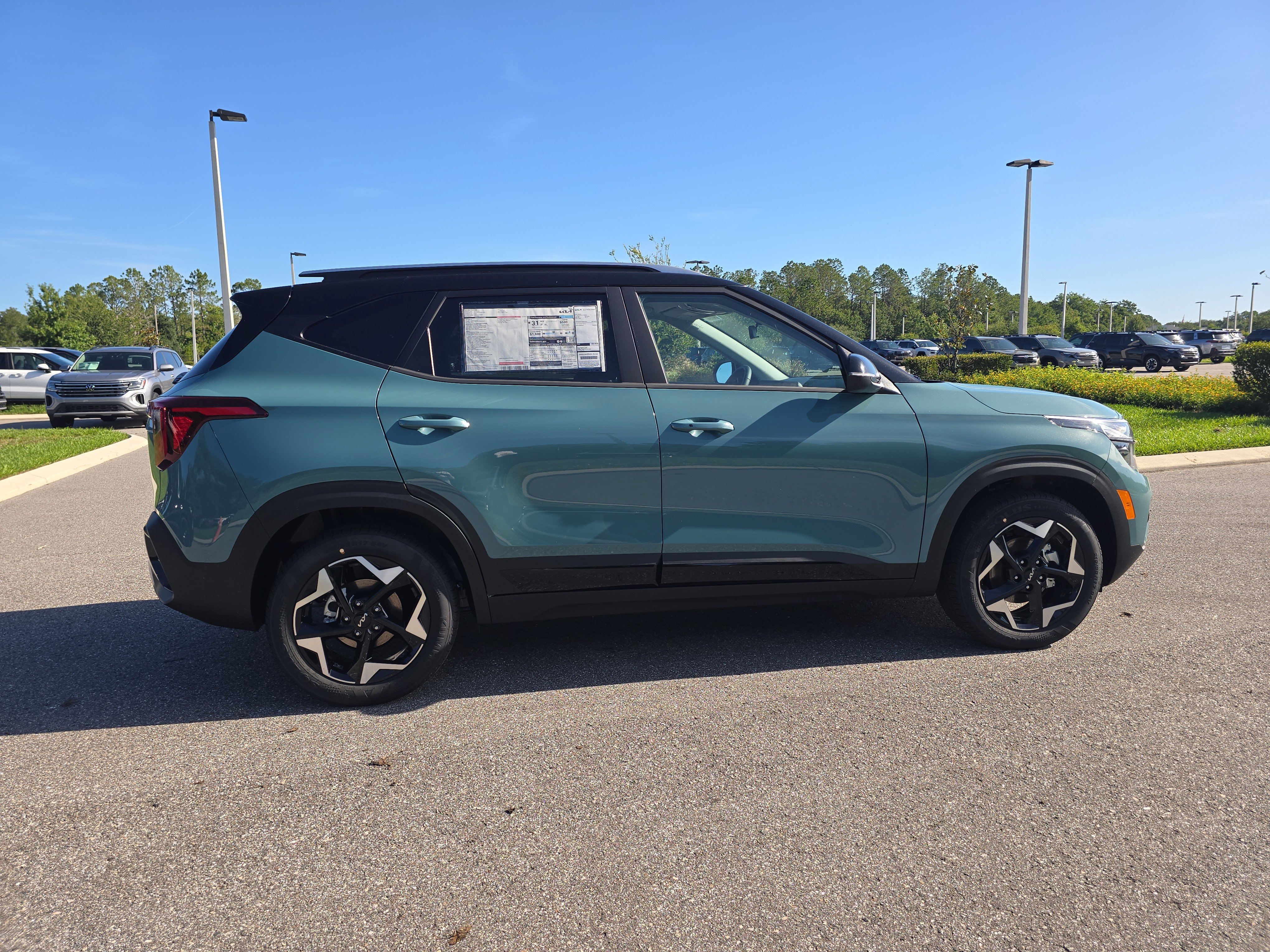 New 2026 Pluton Blue / Black Roof Kia S image 9