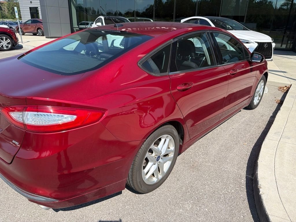 Used 2013 Ruby Red Metallic Ford SE image 8