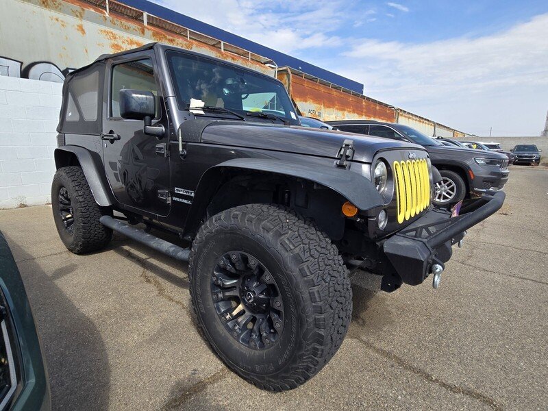 Used 2016 Gray Jeep Sport image 2