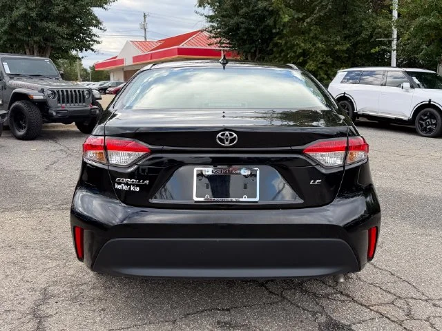 Used 2025 Midnight Black Metallic Toyota LE image 4