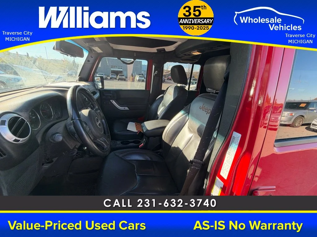 Used 2013 Flame Red Jeep Unlimited Sahara image 33
