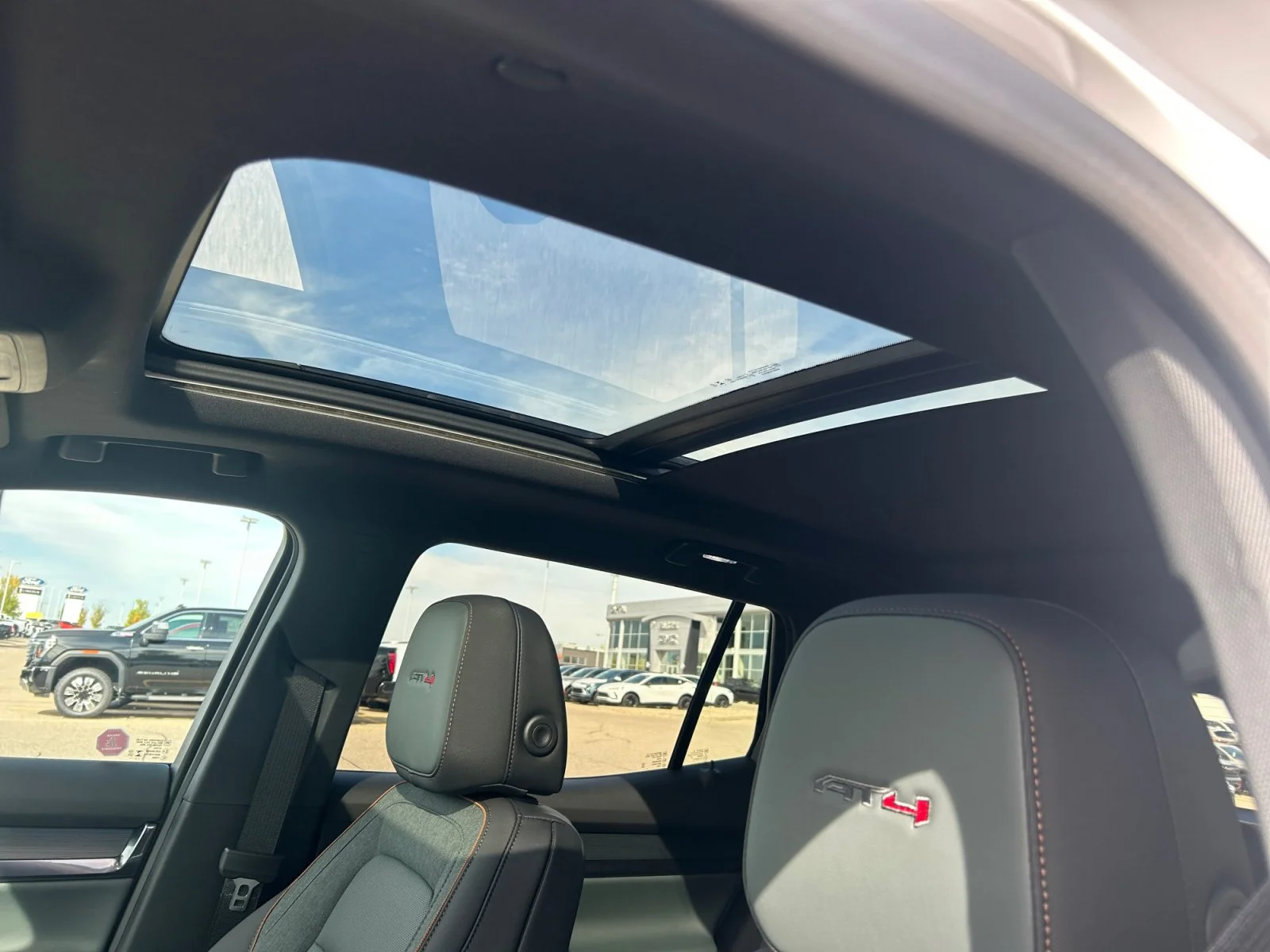 New 2027 Summit White GMC AWD AT4 image 18