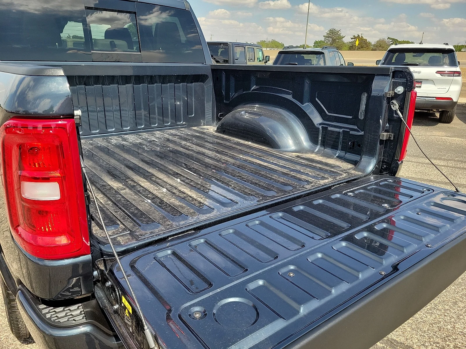New 2026 Forged Blue Ram LARAMIE CREW CAB 4X4 5